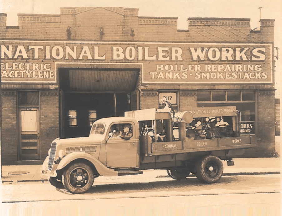 Vintage photo of an NBW truck carrying supplies.