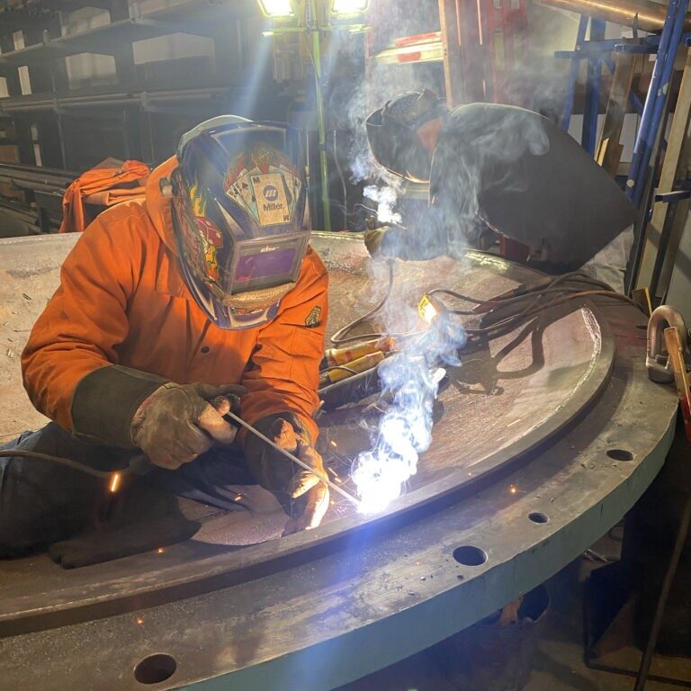 Two NBW workers welding.